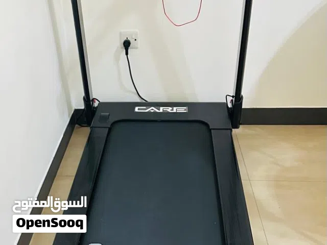جهاز رياضي للمشي وجهاز دراجة
