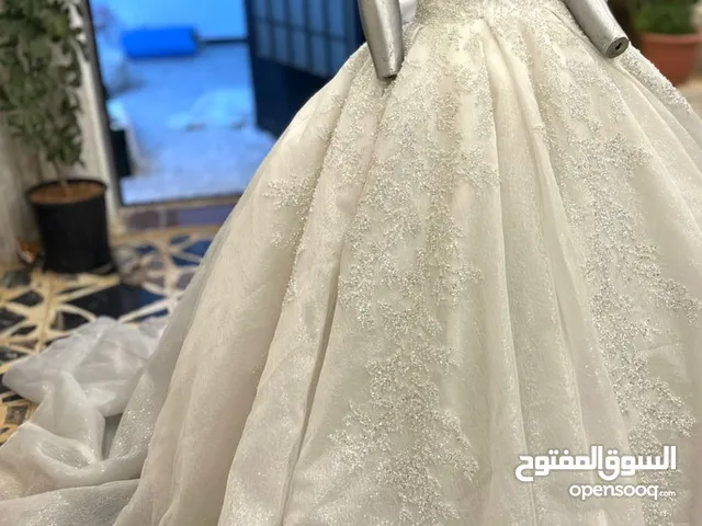 فساتين الاعراس شك ثقيل وفساتين سهره