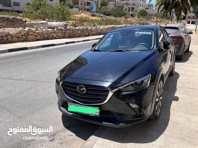 سيارة مازدا موديل 2023 اصل صفر كيلو ماشية 20 الف لون اسود ، بسعر 100000 شيقل نص كاش ونص شيكات.