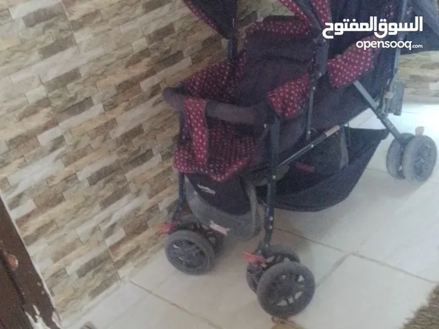 عربايه اطفال توم مستعمله مقبوله للبيع السعر 18 دينار