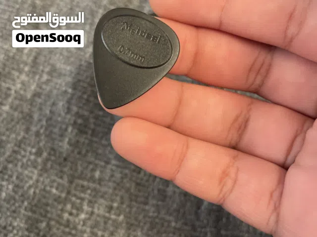 Guitar pics pack of four and packs of eight 0.7mm (cash only)