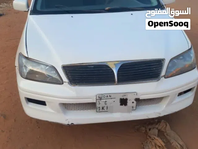 للبيع  في امدرمان  لانسر بومه موديل 2002 . القير عادي . مكنه جربوكس فل . خالي ملاحظات