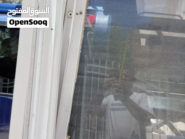 باب سحاب المنيوم في حاله ممتازه مع سككه مقاس الطول 2.10 العرض 2.20