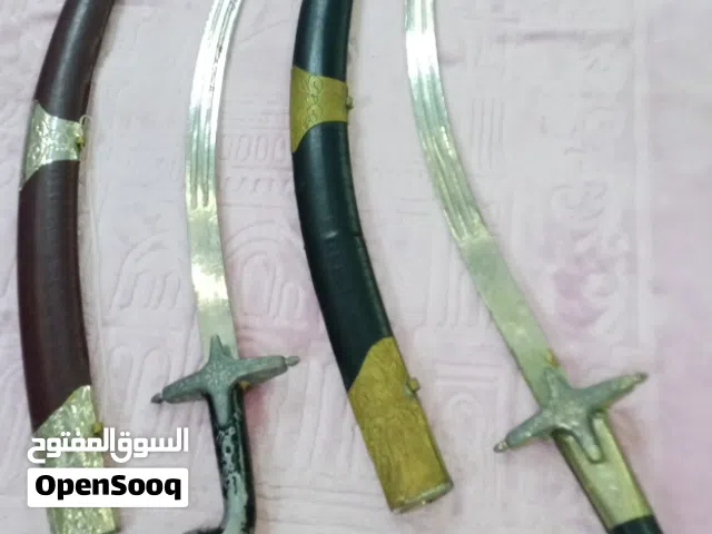 طقم ديكور سيوف عدد 2 للبيع او البدل