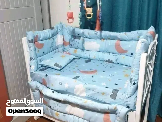 سرير الخشب لاندي المستورد ،يفتح علي سرير الإم حتي عمر 5 سنوات،يوجد شحن ولائي.