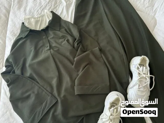 ملابس طقم نسائي