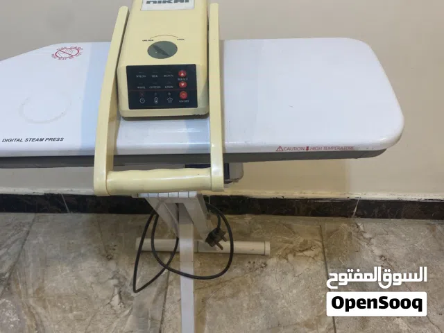 مكواة لوندري