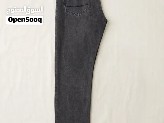 جينز رمادي غامق ستريت فيت — حالة ممتازة