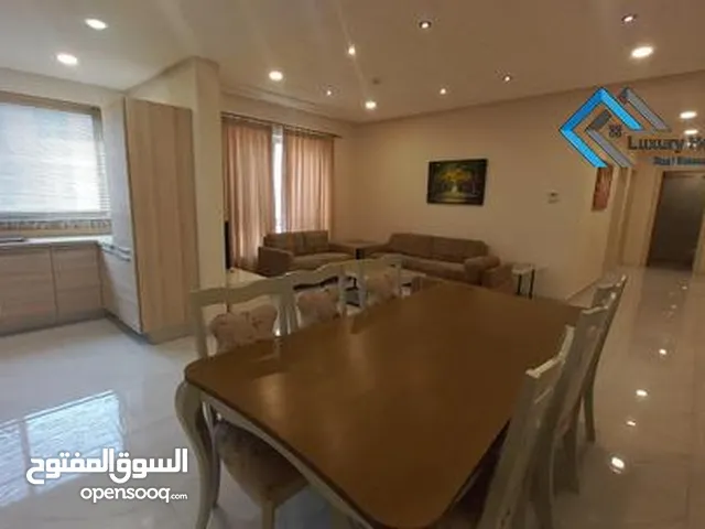 Luxury 2BHK flat with a spacious living room, open kitchen, modern amenities, and elegant interiors.