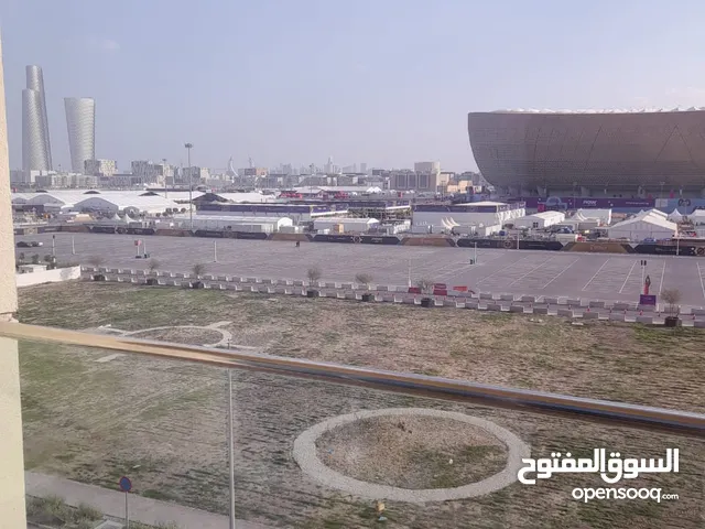 للبيع شقة غرفتين لوسيل مقابل الأستاد مباشرة