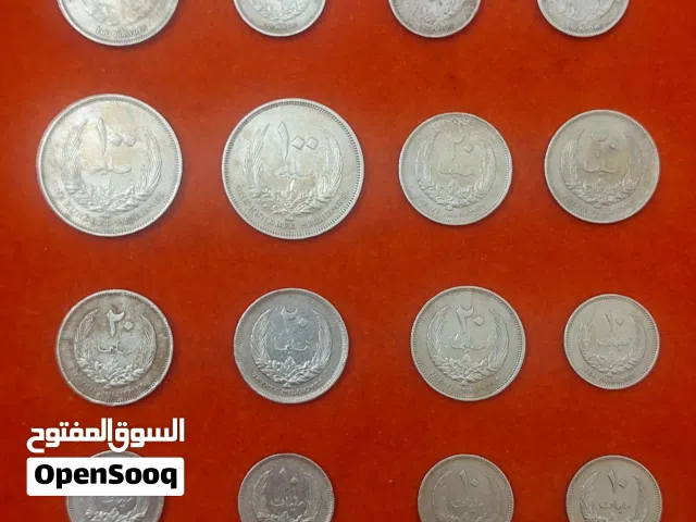 عملات معدنية رأس 1952 وتاج 1965