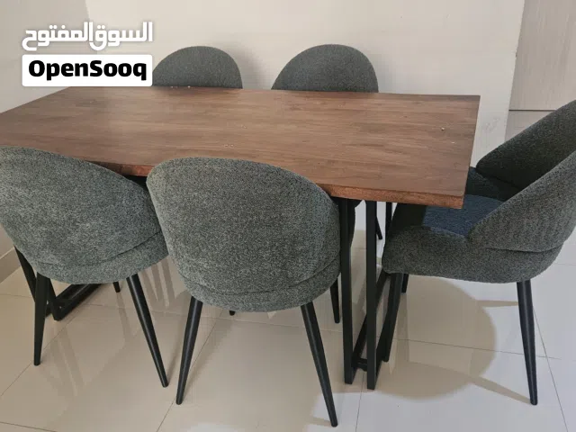 wooden dining table and 6 dining chairs