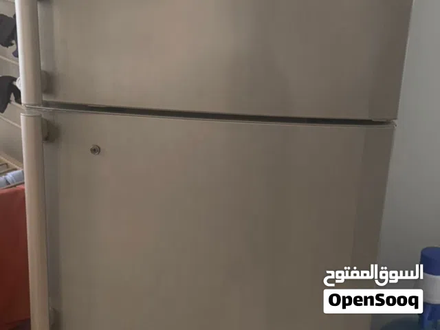 ثلاجة وفرن عادي وفرن كهربائي