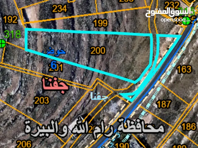 قطعة ارض تجارية على الشارع الرئيسي بين بير زيت و جفنا