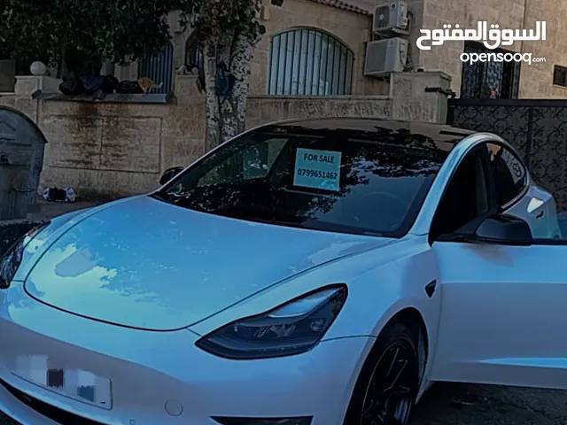 Tesla Model 3 Standard plus2022 تيسلا مودل 3 ستاندرد بلس موديل 2022 اللون الخارجي ابيض لؤلؤي مميز
