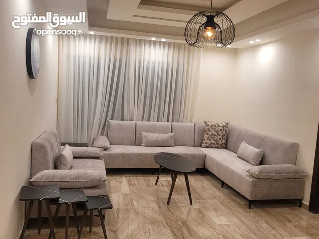 شقة ارضية ثلاث غرف نوم في - دير غبار - بترس و حديقة و كراج خاص و بموقع مميز (7123)