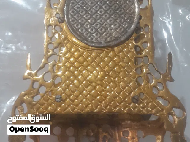ساعة نحاسية  قديمة بحالة ممتازة شغالة