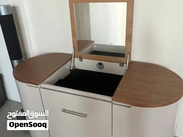 Table with folding mirror