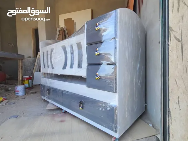 هندول هزاز اطفال لعمر 4سنين مزود ب 4ادراج هندول وسرير ودولاب بنفس الوقت