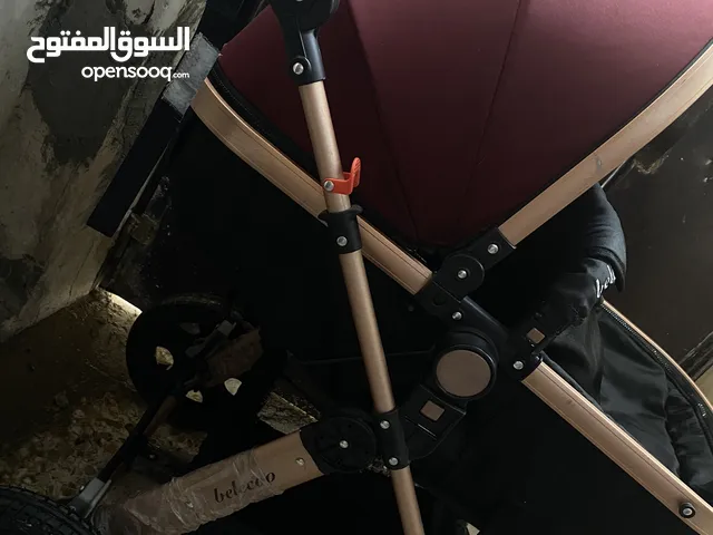 عربانه اطفال تصير سرير وتصير مقعد جلوس طفل قويه جدا ونضيفه