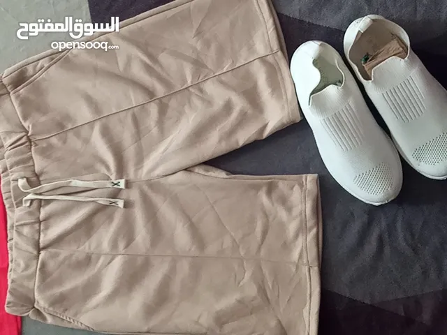 تشكيلة مركبة شورت وتيشرت وحذاء ابيض كله على 45دينار اسعار حرق بضاعة تصفية .