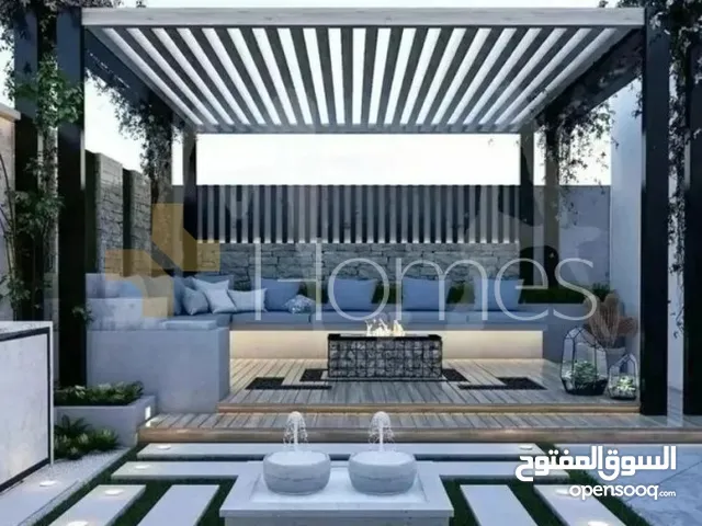 شقة ارضية مع حديقة للبيع في رجم عميش بمساحة بناء 187م