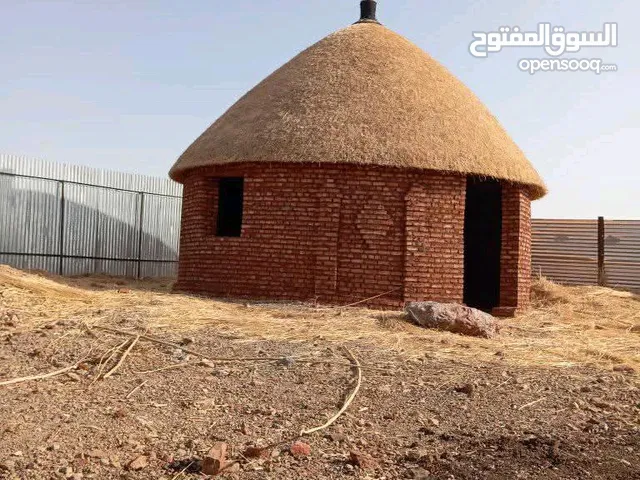 ارض استثمارية في المدينة الصناعية ام الطيور مربع واحد مساحة كبيرة مصنع زيوت