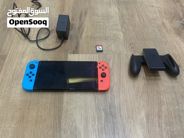 Nintendo switch oled (with game)