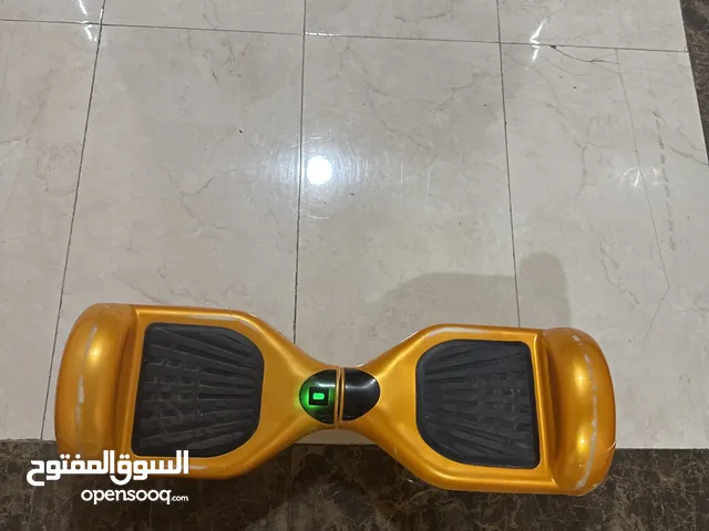 Yellow Hover board there is some scratches but everything working with the charger