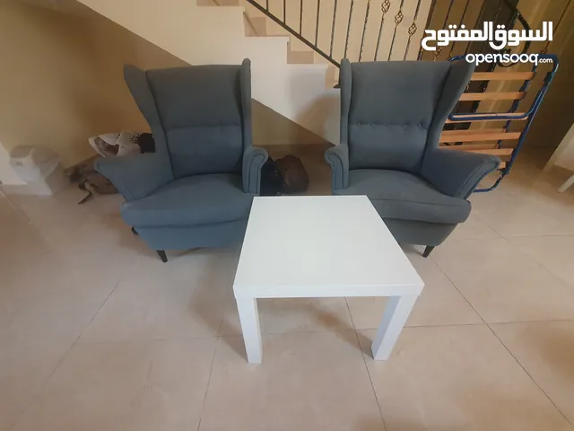 2x Stylish High Back Armchairs with Modern Coffee Table