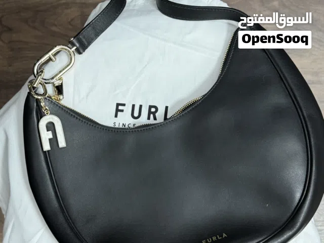 new furla crescent bag with charm