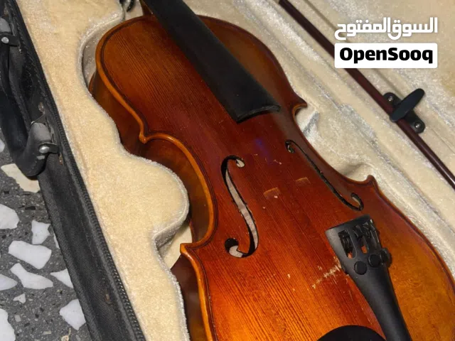 كمان اصلي ياباني نواقص قليلة بس اوتار و غزالة