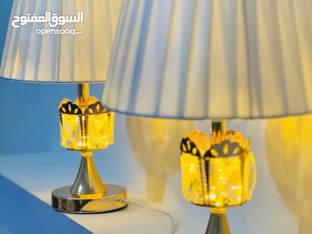 تحف من البلور والرخام وشمعدنات وسهارات