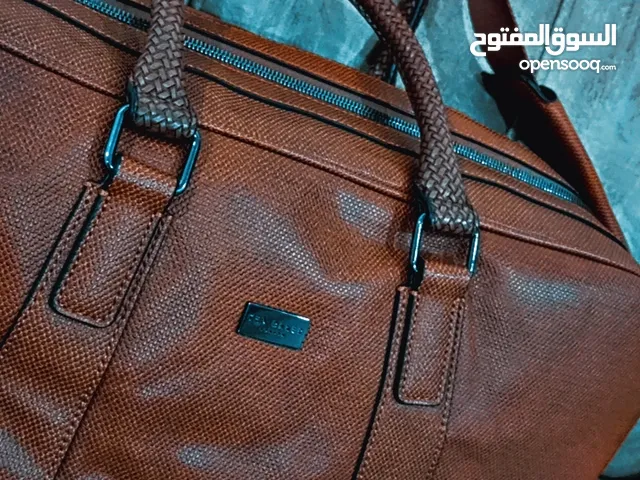 شنطة يد أنيقة جدا حجم كبير لون بني ماركة تيد بيكر أصلي لعدة استعمالات