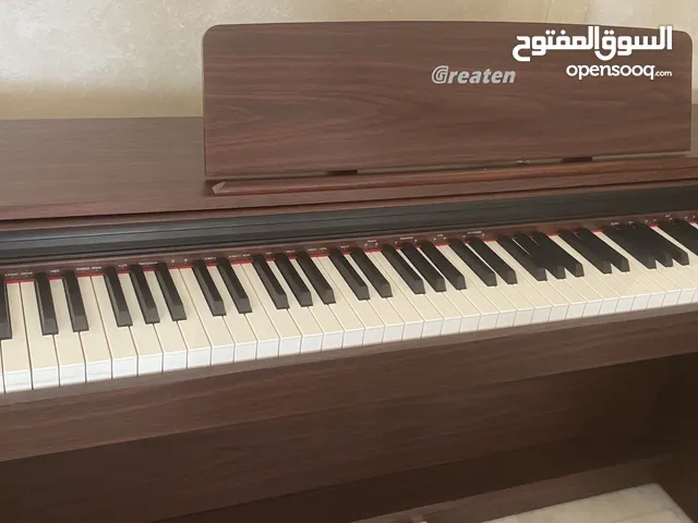 Greaten piano new model amazing brownish black color no key broken functioned with metronome