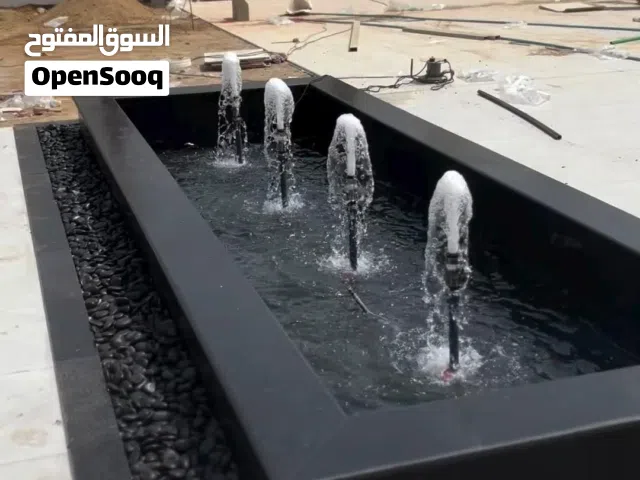 تنسيق حدائق عمل شلالات نوافير المياه ديكورات منازل مودرن