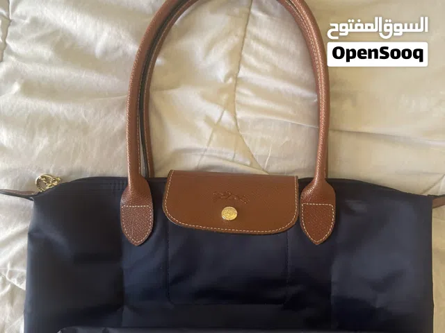 Longchamp le pliage size s long handle used for only a month