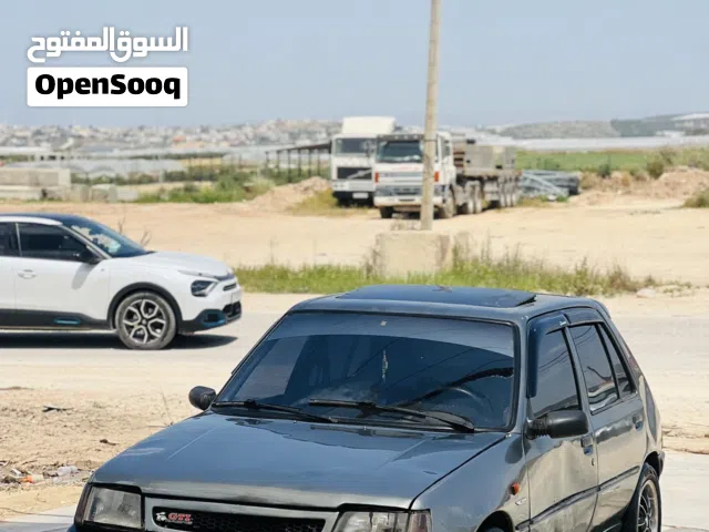 1990 بيجو 205