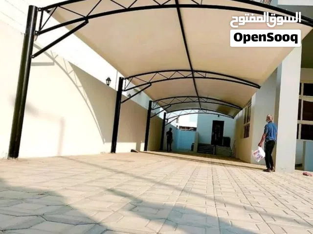 بناء ملاحق سقف سندويش بنل مضلات سواتر ديكورات دهنات  جنيع انواع الحداده وتلبيس  الابواب بديل الخشب