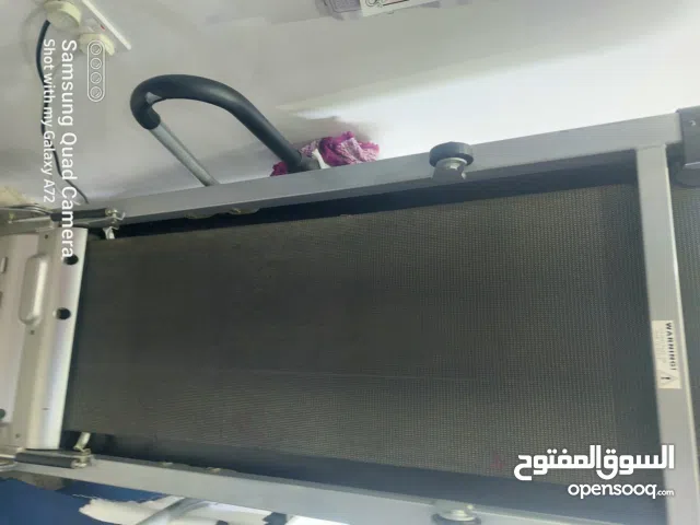 Excellent condition Tred mill, 6 door Cupboard, 1 wooden double bed, one wooden single bed, twooden