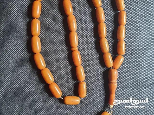 سبحة مسبحة كهرب بولندي لون انتيك 56.48 غم