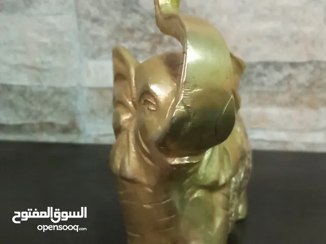فيل نحاس منقوش