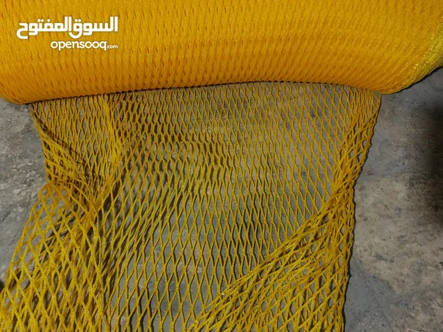 شبك لون اسود و اصفر لمناطق الالعاب وبرك الطابات والمتاهات