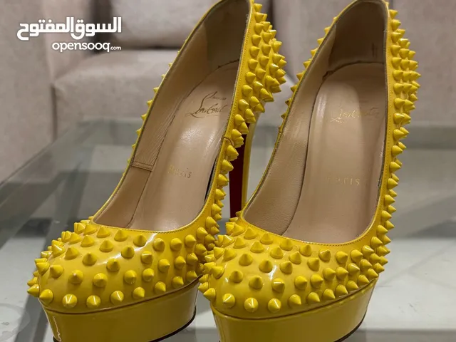 Christian Loubotin yellow Patent Leather
