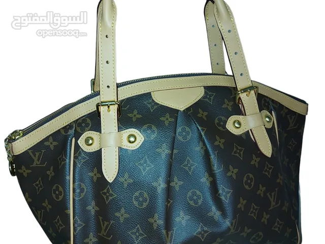 Unused Louis Vuitton Tivoli Bag