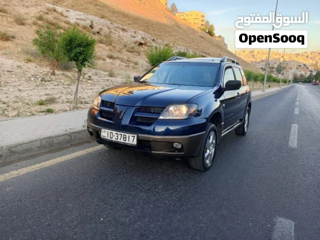 2003 ميتسوبيشي اوتلاندر GLS