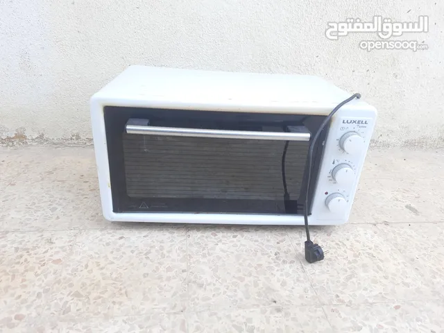 فرن LUXELL مستعمل بحالة جيدة وسعر مغري. 26 . لا يوجد معهو صواني...............
