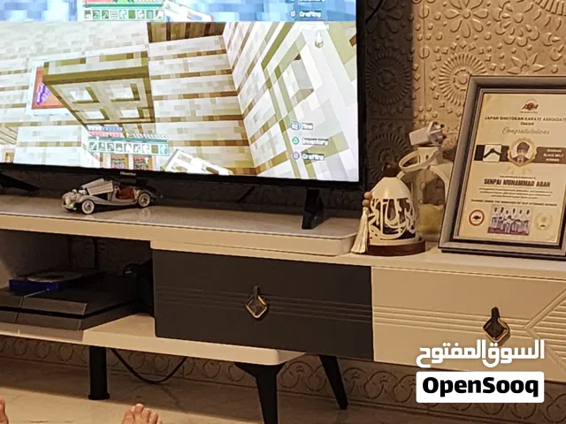 TV Trolley Adjustable Length, Center Coffee Table and Show pieces.
