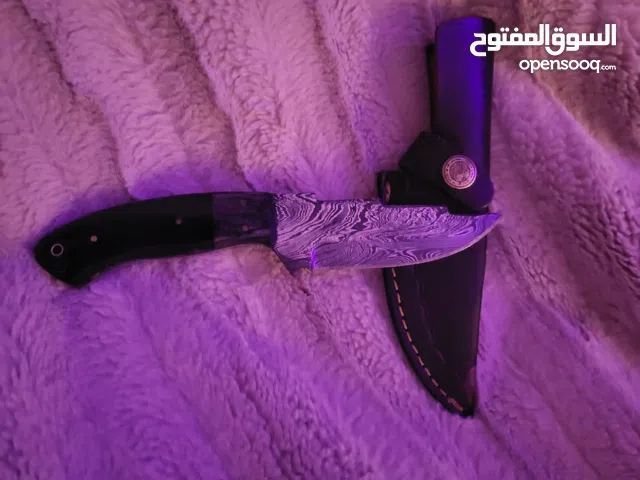 black wood glassed out finished with a sheath ( used mostly for design and soft use)