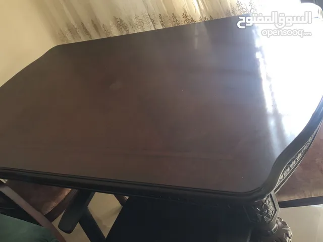 طاولة صفرة مع 6 كراسي خشب
